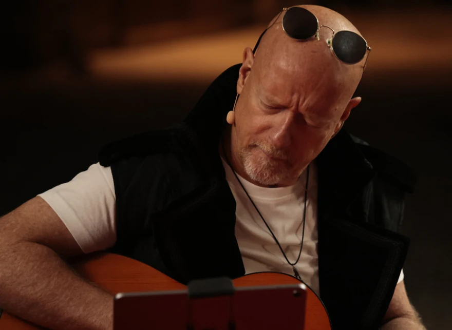 Brian Thomas Johnston playing guitar